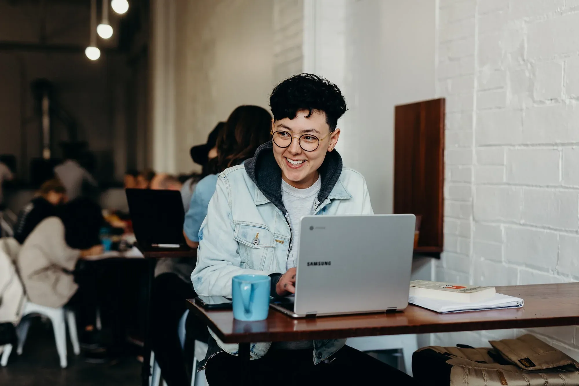 Image of a remote worker in a cafe setting