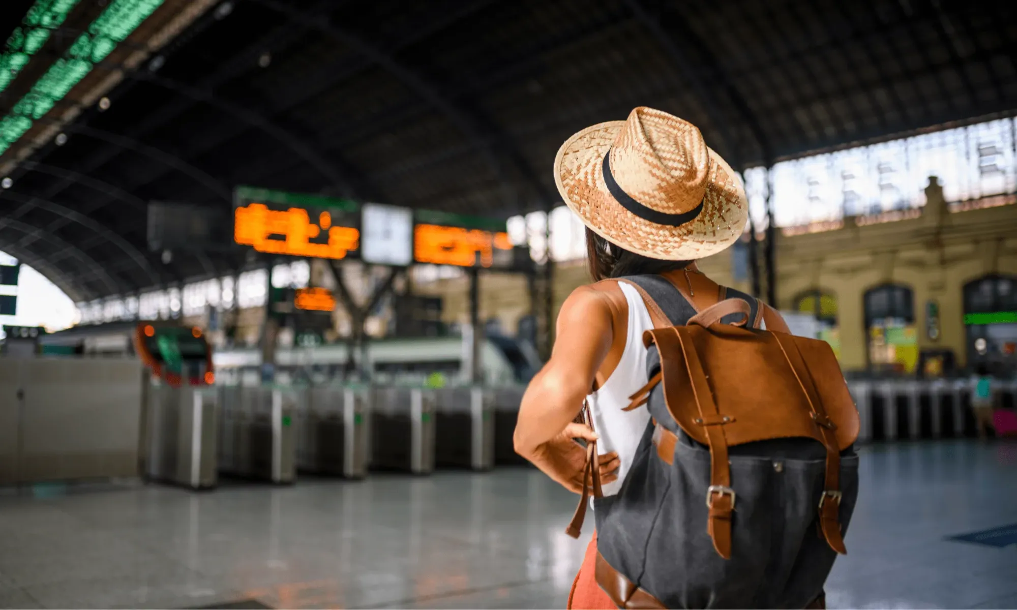 Female digital nomad at a train station