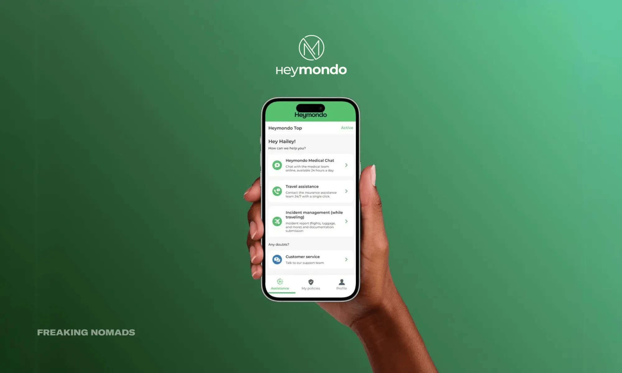 Heymondo Travel Insurance app on a phone held by a human hand
