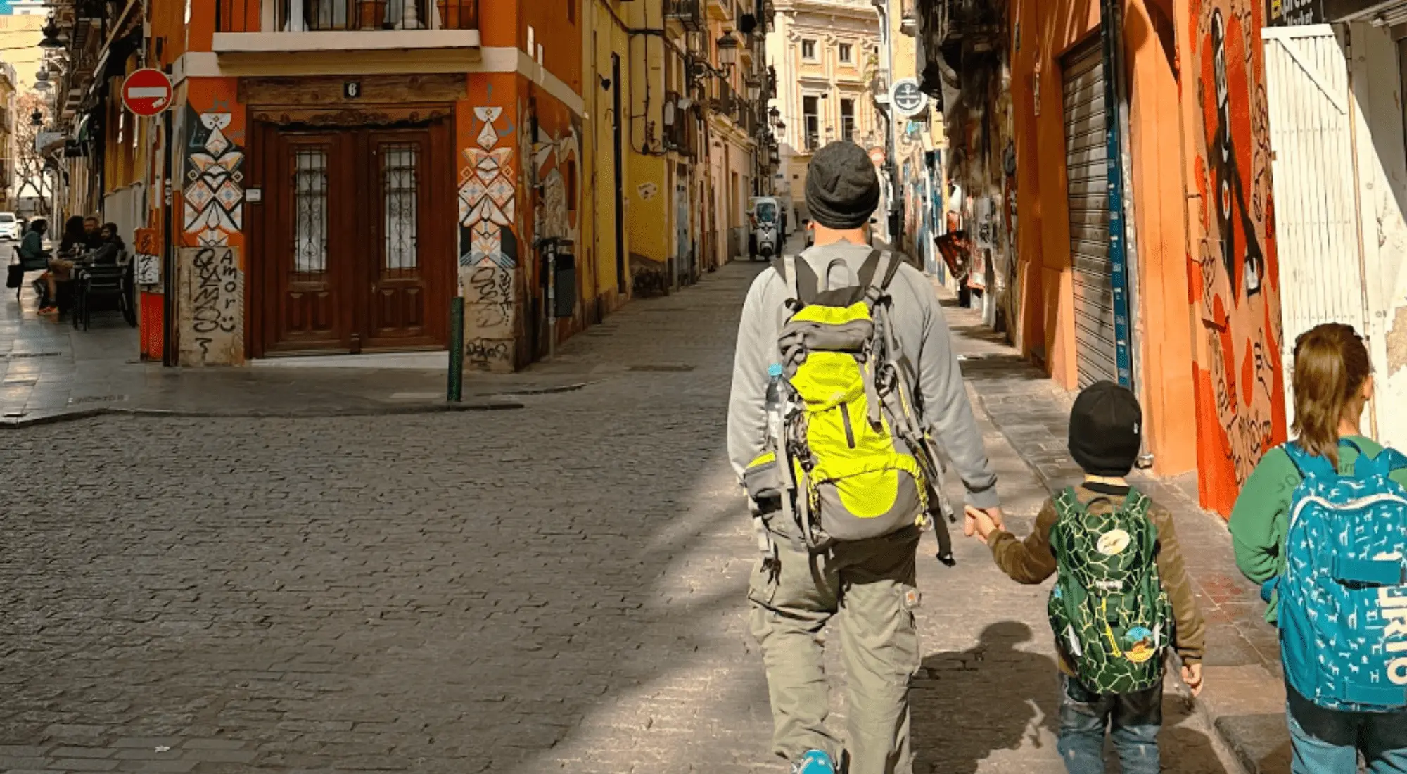 Digital nomad dad with children in a European city