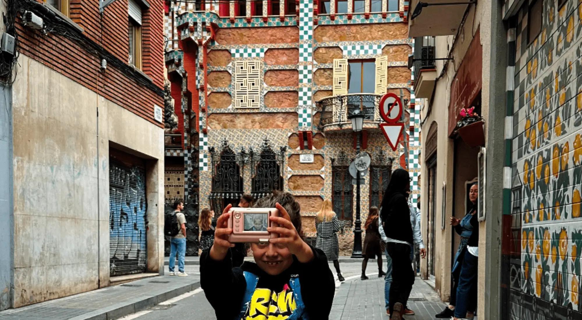 Digital nomad kid taking pictures while traveling