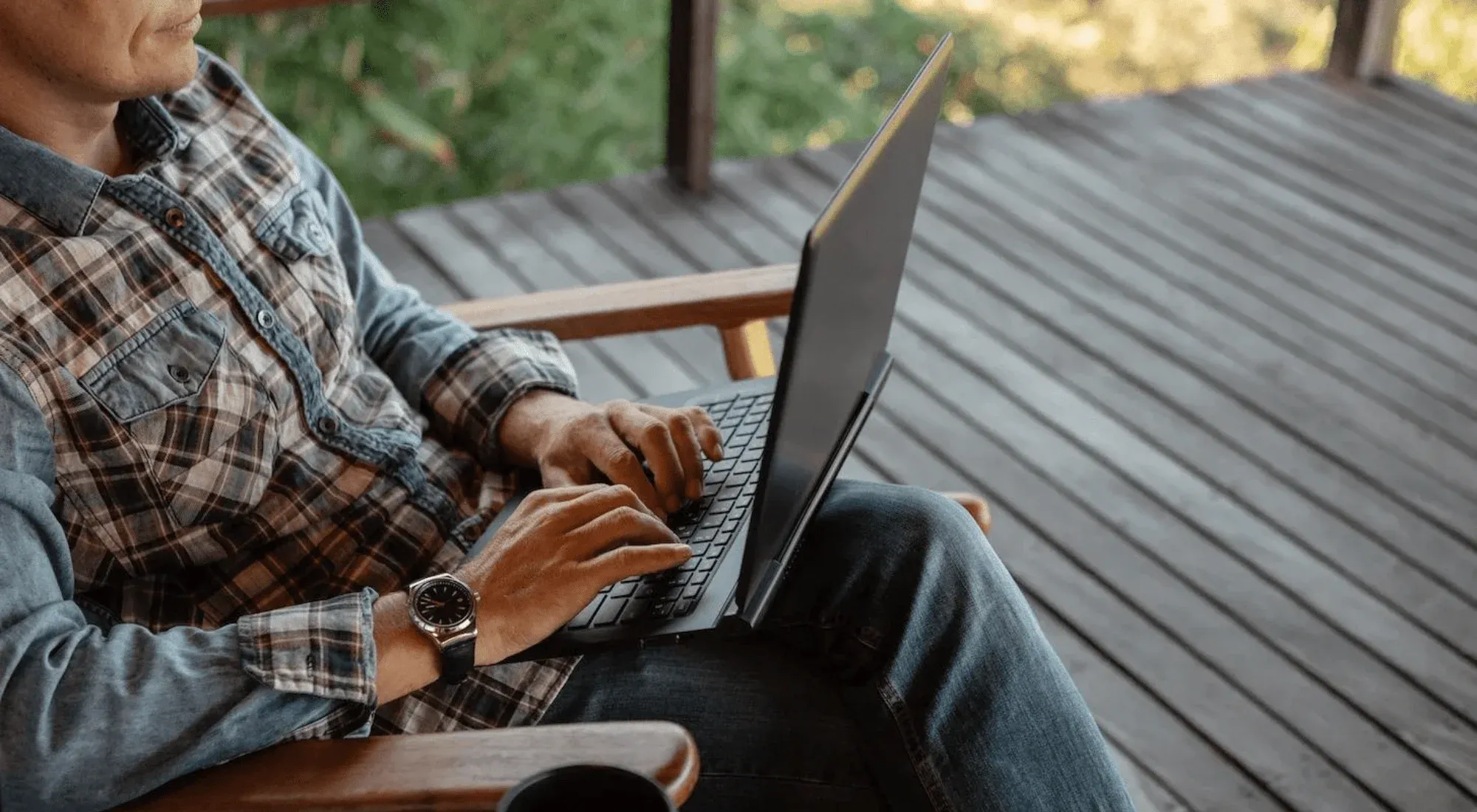 Digital nomad working on his laptop