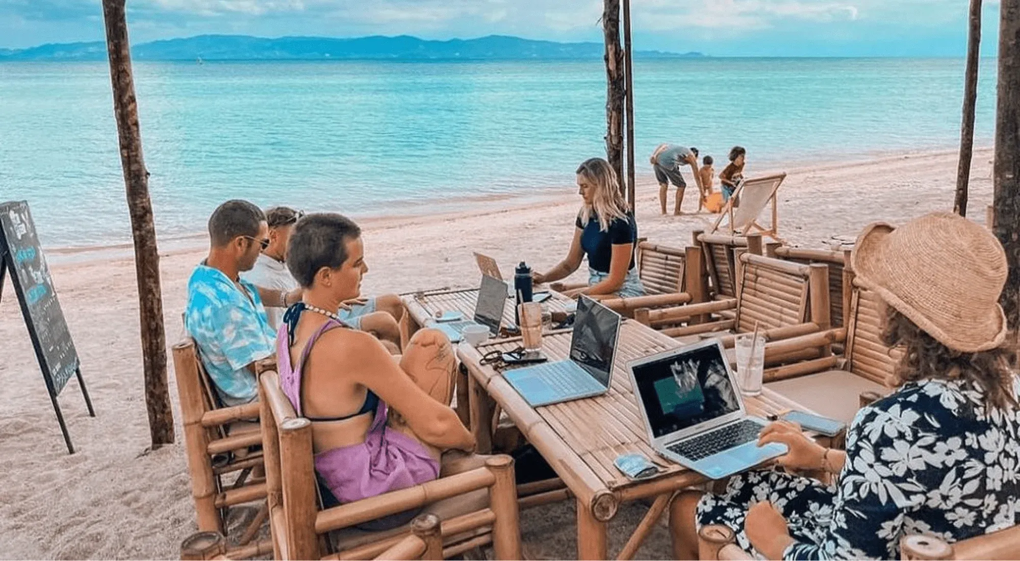 Digital nomads working at the beach in Thailand