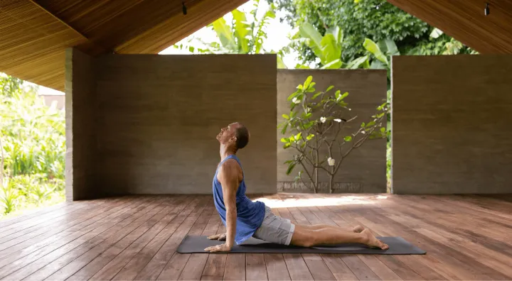 A traveler practicing yoga on the go